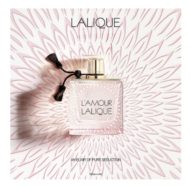 تصویر بطری عطر لالیک لامور با طراحی شیک و رنگهای گرم عطر وادکلن عزیز پرفیوم